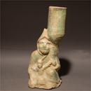 A Green Glazed Pottery Candle Holder