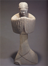 A Grey Earthenware Figure