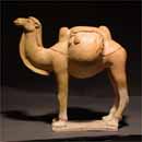 A Straw Glazed Pottery Camel with Saddle