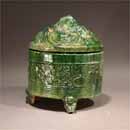 A Green Glazed Pottery Hill Jar and Cover