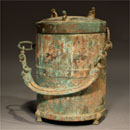 A Bronze Vessel with Chain and Cover
