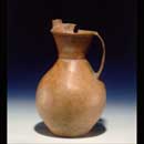 A Rare Thin Red Pottery Jar with Handle, Qi Jia Culture