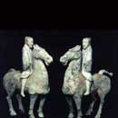 A Pair of Painted Pottery Horses with Riders