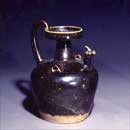 A Te-Ching Ware Black Glazed Hu with Chicken