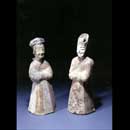 Pair of Painted Grey Pottery Figures of a Couple