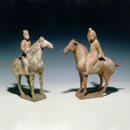 A Pair of Painted Pottery Horses with Riders