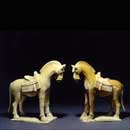 A Pair of Yellowish-Glazed White Pottery Horses