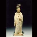 A Rare Painted Red Pottery Figure of a Court Lady with a Bird