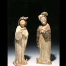 A Pair of Painted Pottery Figures of Court Ladies with Birds