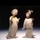 A Rare Pair of Painted Red Pottery Figures of Court Ladies with Birds