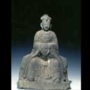 A Sandstone Figure of Seated Quan Yin