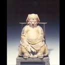 A Painted Stucco Figure of a Seated God of Fortune