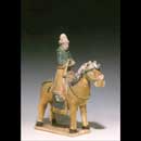 A Green-Glazed Pottery Horse and Rider