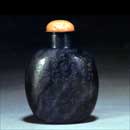 A Black and White Suzhou Jade Snuff Bottle