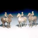 Three Painted Grey Pottery Equestrian Figures from Xian