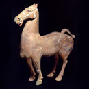 A Painted Grey Pottery Figure of a Horse