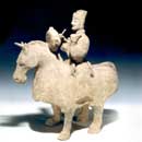 A Rare Grey Pottery Figure of a Mounted Drummer on a Horse