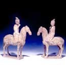Two Painted Grey Pottery Horses with Riders