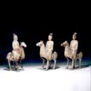 Three Painted Grey Pottery Horses with Riders