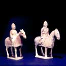 A Pair of Painted Pottery Horses with Riders