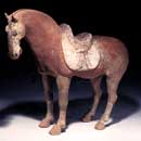 A Painted Red Pottery Figure of a Horse