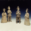 Four Painted Grey Pottery Figures of Ladies