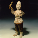 A Rare Painted Grey Pottery Figure of a Soldier